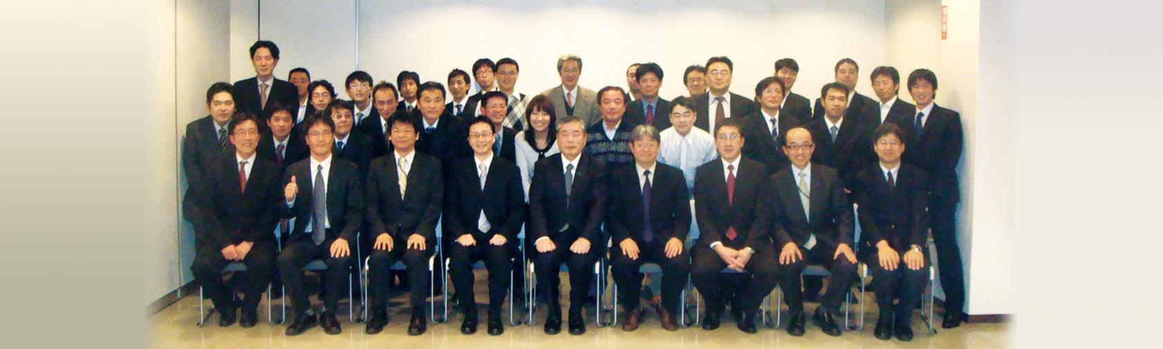 Send-off party for a project in China (in February 2010, front row, fourth from the left)