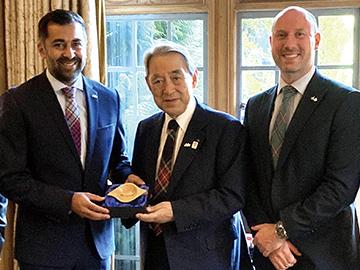 From left, First Minister Humza Yousaf, Chairman Matsumoto, and Cabinet Secretary Neil Gray