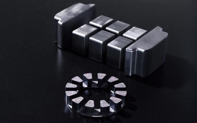 形状自由で小型化、軽量化を実現する「圧粉磁心」～卓越した特性が新たな市場を生み出す～