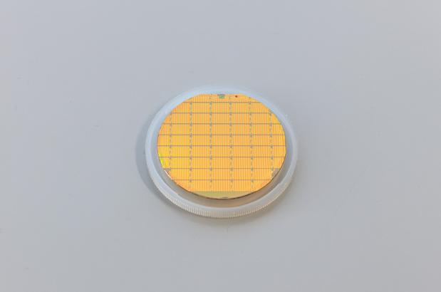 2-inch wafer (manufactured at that time) on which GaN HEMT chips (transistors) were formed