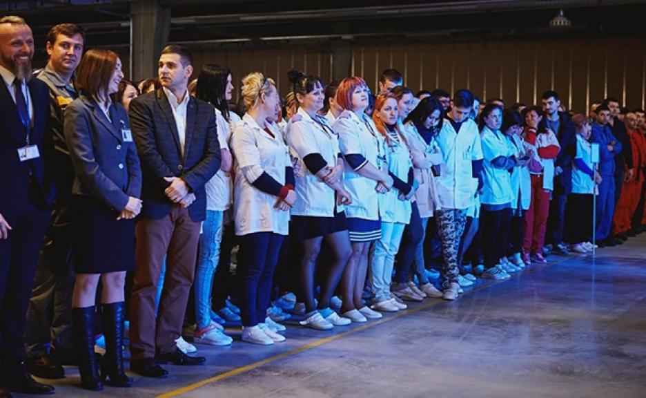 Employees of S.R.L. SE Bordnetze at the opening ceremony