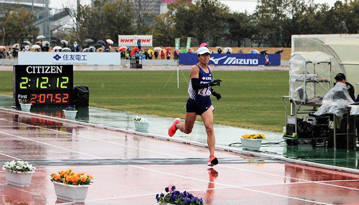 Mr. Fujimura, crossing the finish line