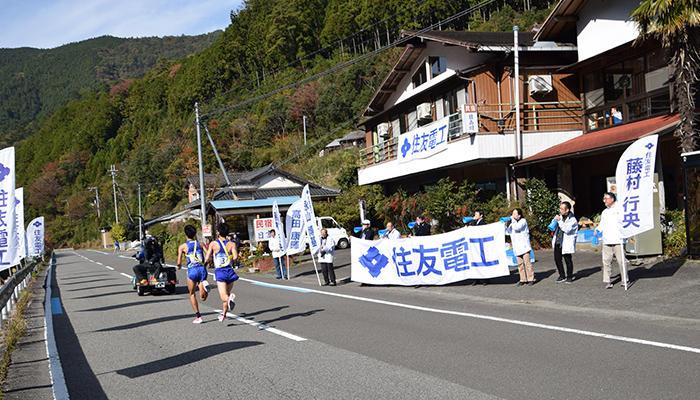 Rooting for our team enthusiastically along the street