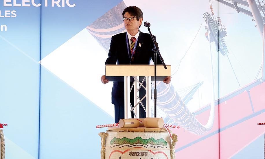 President Osamu Inoue giving a speech at the groundbreaking ceremony